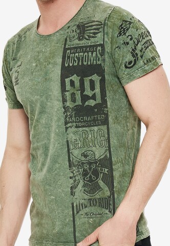 Rusty Neal T-Shirt mit modernem Front & Back Print in Grün