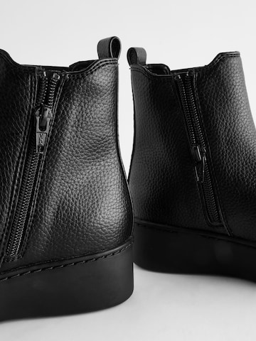 Bottes Next en noir