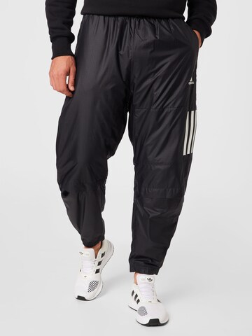 ADIDAS SPORTSWEAR Tapered Workout Pants in Black: front