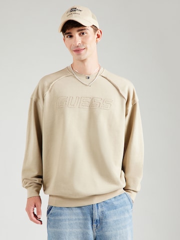 GUESS Collegepaita värissä ruskea: etupuoli