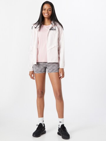 NIKE Functioneel shirt 'Miler' in Roze