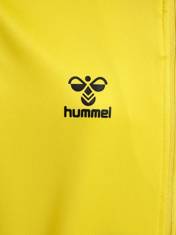 Veste de survêtement 'ESSENTIAL' Hummel en jaune