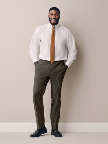 regular Pantaloni con piega frontale 'Motionflex' di Next in marrone