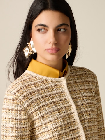 Cardigan oltre en beige