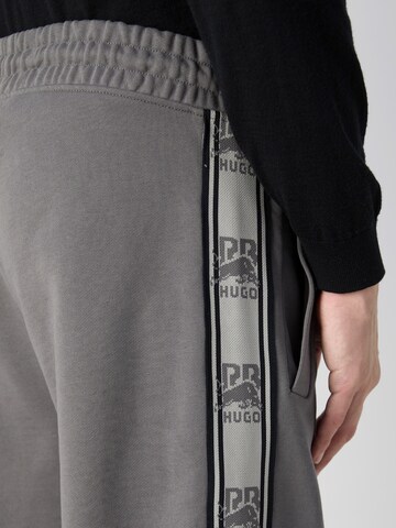 Loosefit Pantalon 'Dishorte' HUGO en gris
