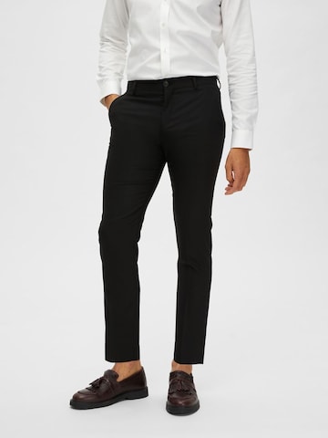 Coupe slim Pantalon à plis SELECTED HOMME en noir : devant