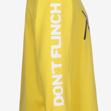 PUMA Performance Shirt 'Puma x Black Fives' in Yellow