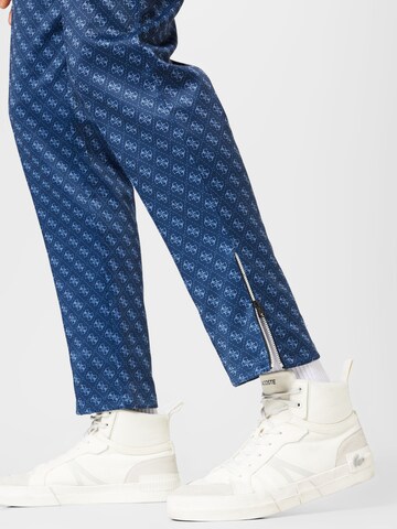 Slimfit Pantaloni 'Korbin' de la GUESS pe albastru