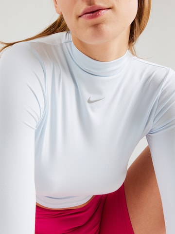 NIKE Performance shirt 'ONE LUXE ESS' in Blue
