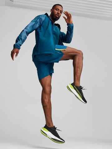 PUMA Sportovní bunda 'RUN FAVORITE AOP' – modrá