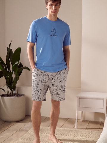 Next Lyhyt pyjama 'Grumpy' värissä sininen