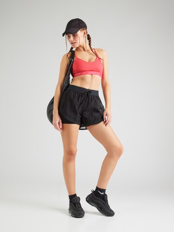 Bustier Soutien-gorge de sport 'INDY' NIKE en rose