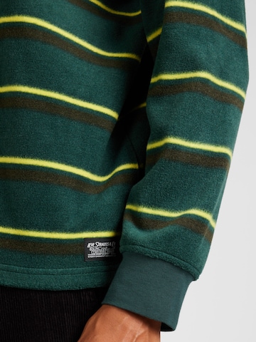 LEVI'S ® Collegepaita 'Sherpa Crewneck Sweatshirt' värissä vihreä