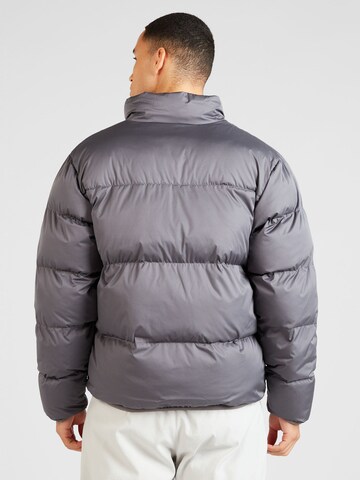 Veste d’hiver 'Club' Nike Sportswear en gris