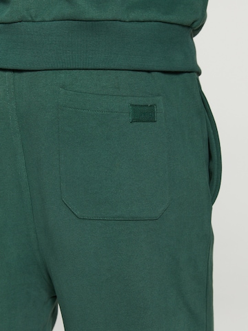 Shiwi Zwężany krój Spodnie w kolorze zielony