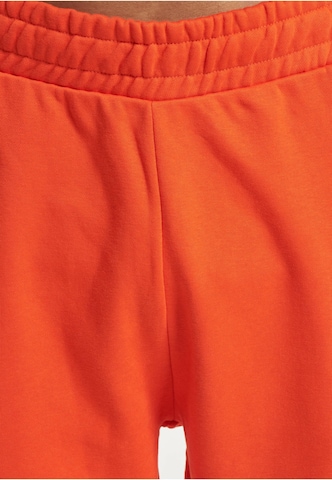 Ecko Unlimited Loose fit Pants in Orange