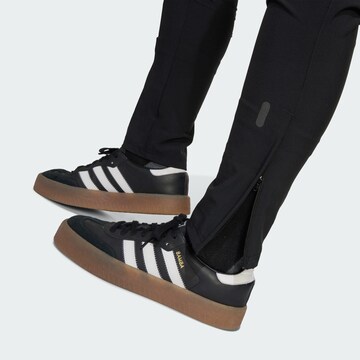 Regular Pantalon de sport 'Manchester United Tiro 25 Competition' ADIDAS PERFORMANCE en noir