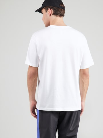 T-Shirt 'ABOVE' Nike Sportswear en blanc