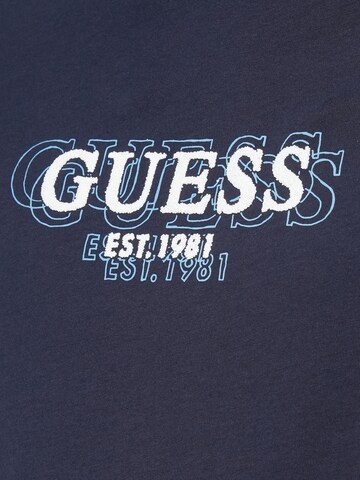 GUESS Bluser & t-shirts i blå