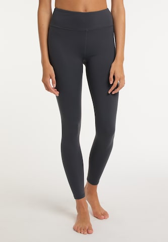 Skinny Leggings de la IZIA pe gri: față