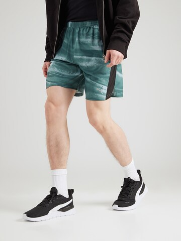 PUMA Обычный Спортивные штаны 'VELOCITY' в Зеленый: спереди