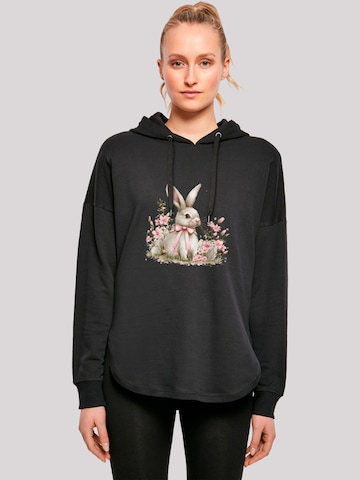F4NT4STIC Sweatshirt 'Niedlicher Osterhase mit Blumen' in Zwart: voorkant