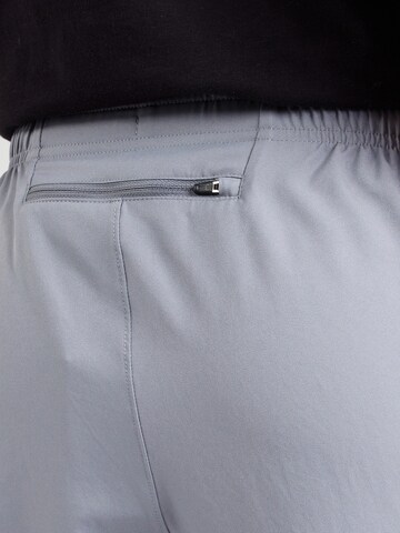 NIKE Tapered Sports trousers 'CHALLENGER' in Grey