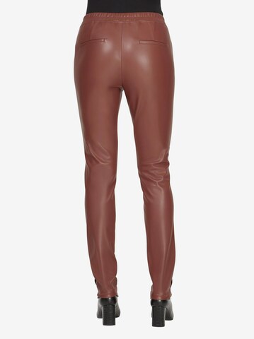 Skinny Leggings di heine in marrone