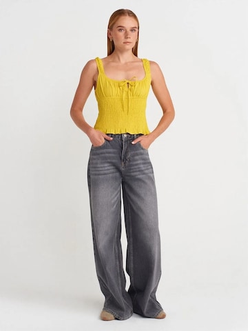 Top di Dilvin in giallo