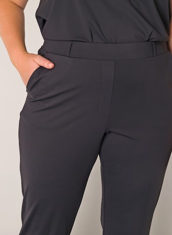BASE LEVEL CURVY Flared Pants in Black