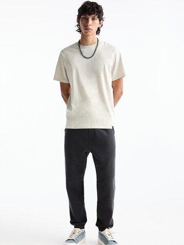 Tapered Pantaloni di Pull&Bear in grigio