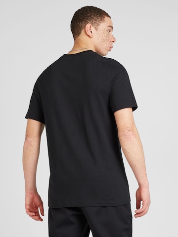 T-Shirt 'SWOOSH' Nike Sportswear en noir