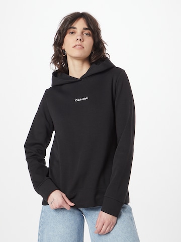 Sweat-shirt Calvin Klein en noir : devant