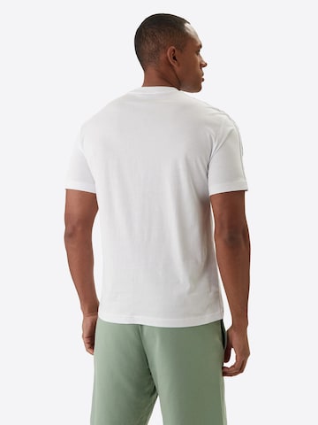 Maglietta di EA7 Emporio Armani in bianco