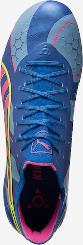 Chaussure de foot 'King Ultimate FG/AG' PUMA en bleu