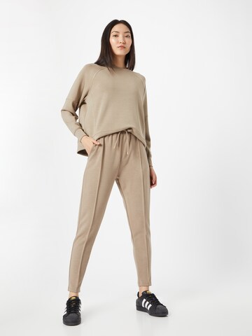 Athlecia Skinny Sports trousers 'Jacey' in Brown
