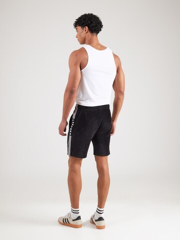 Regular Pantalon ELLESSE en noir