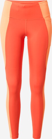 NIKE Skinny Sportbroek in Oranje: voorkant