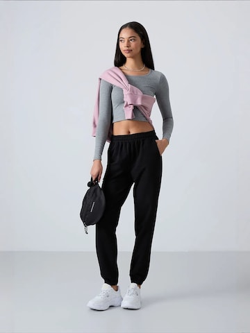 Effilé Pantalon de sport Tommy Life en mélange de couleurs
