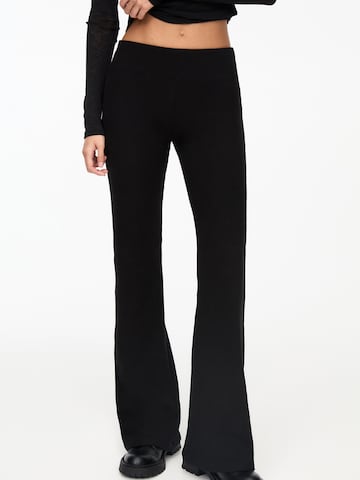Pull&Bear Flared Trousers in Black: front