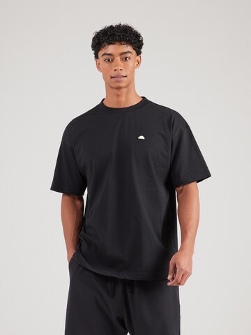 Tricou 'Play Nice' de la ELLESSE pe negru