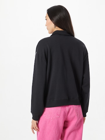 LEVI'S ®Sweater majica 'Graphic Rue 1/4 Zip Crew' - crna boja