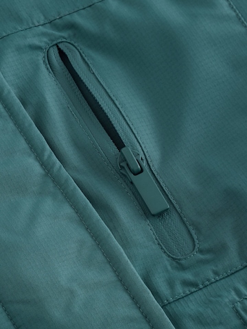 Next - Abrigo en azul