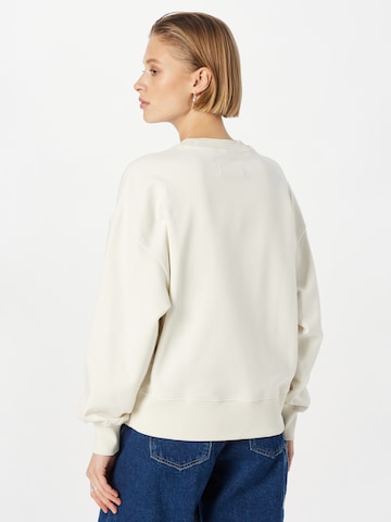 Calvin Klein Jeans Collegepaita värissä beige