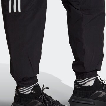 Tapered Pantaloni 'Adicolor Classics Trefoil' di ADIDAS ORIGINALS in nero