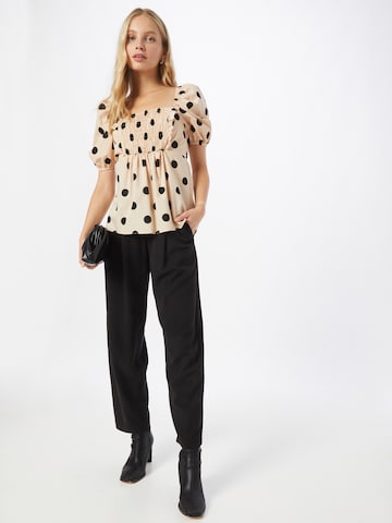 River Island - Blusa en beige