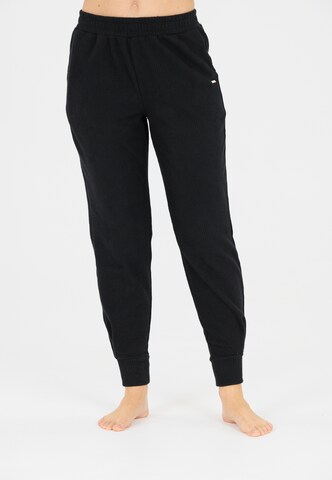 Athlecia Regular Sports trousers in Black: front