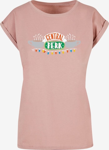 ABSOLUTE CULT Shirt 'Friends - Central Perk Christmas Lights' in Roze: voorkant