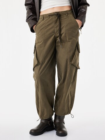 Koton Loose fit Trousers in Green: front