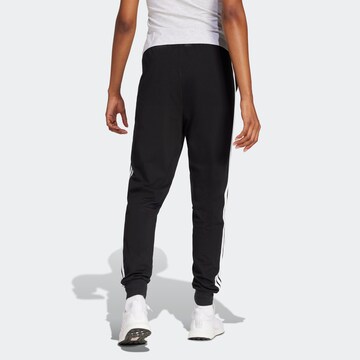 Tapered Pantaloni sport de la ADIDAS SPORTSWEAR pe negru
